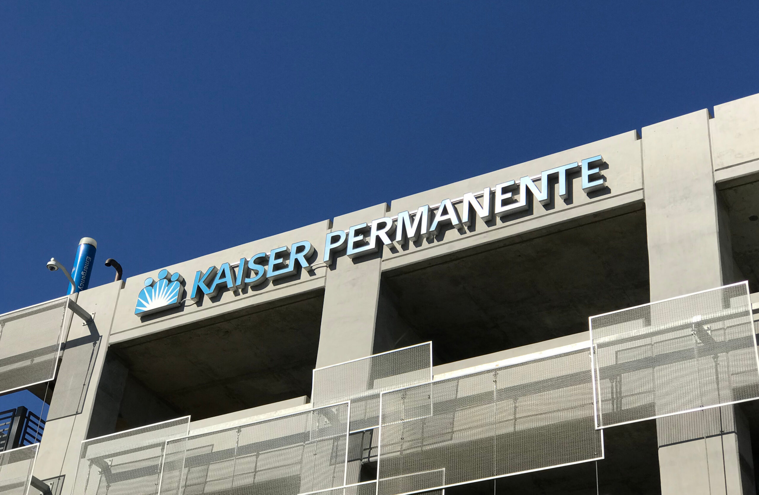 Kaiser Permanente logo sign on top of the parking garage at the West Los Angeles Medical Center