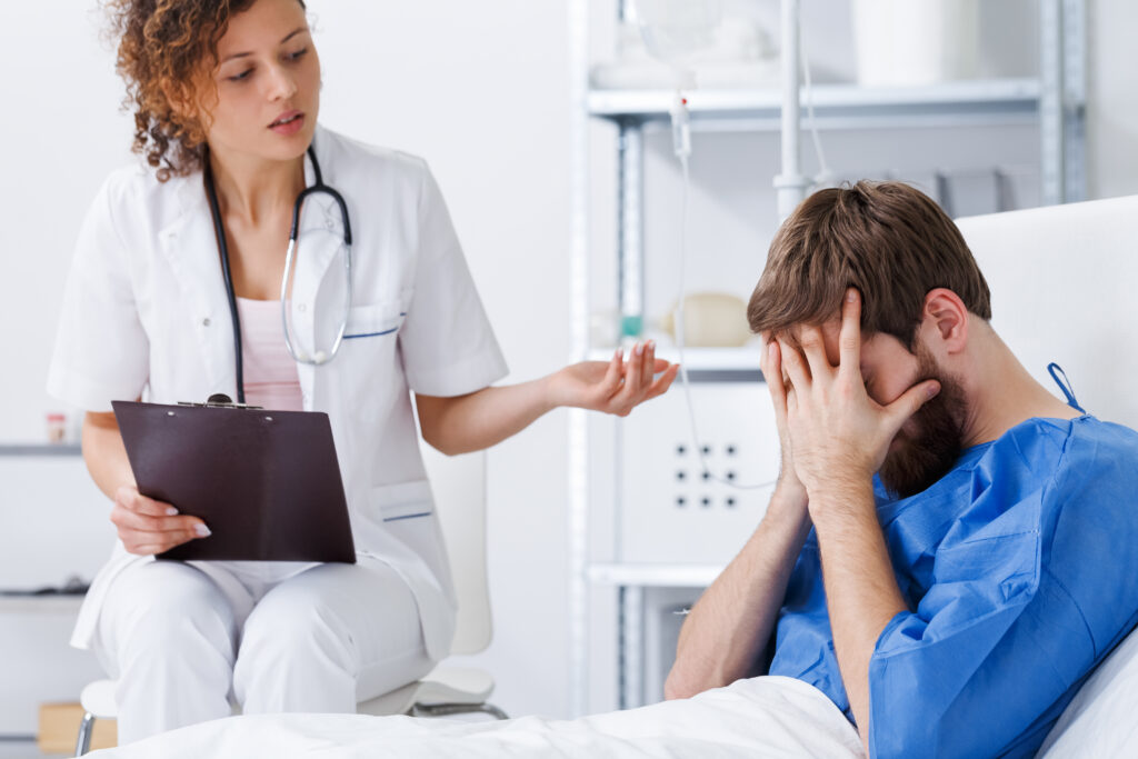 Psycotherapy nurse helping upset patient